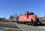 M&E GP7u # 23 leads the first train of the day across the Algonquin Parkway Grade Crossing 